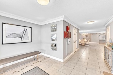 Come live on the beach in this private, boutique building. New