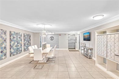 Come live on the beach in this private, boutique building. New