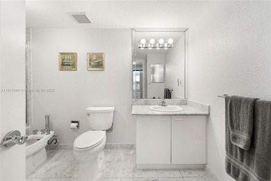 OPPORTUNITY ON THE OCEAN.  THIS SPACIOUS 2/2 FEATURES A FULL