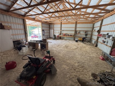 Start your Lake of the Ozarks adventure with this 1960 home full