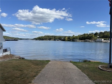 Start your Lake of the Ozarks adventure with this 1960 home full