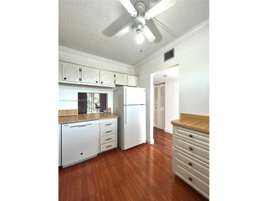 Welcome to this bright, freshly painted, and clean 2-bedroom