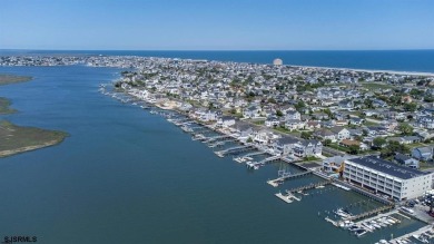 Enjoy coastal living at its best in thsis bright and spacious 1