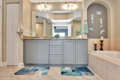 Welcome to this gorgeous three-bedroom, two-bathroom beach home