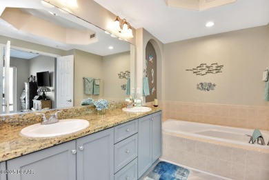 Welcome to this gorgeous three-bedroom, two-bathroom beach home