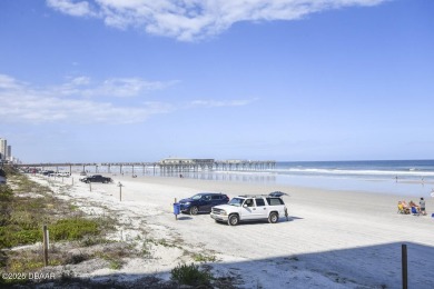 Welcome to this gorgeous three-bedroom, two-bathroom beach home