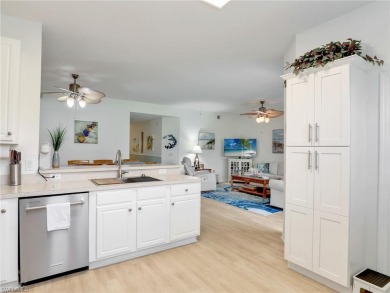 FULL GOLF MEMBERSHIP INCLUDED with this pristine 2/2 1st floor