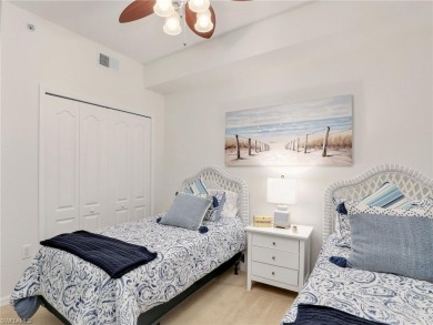 FULL GOLF MEMBERSHIP INCLUDED with this pristine 2/2 1st floor