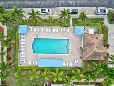 FULL GOLF MEMBERSHIP INCLUDED with this pristine 2/2 1st floor