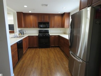 This charming condo offers stunning, expansive views of Lake