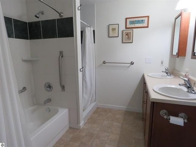 This charming condo offers stunning, expansive views of Lake