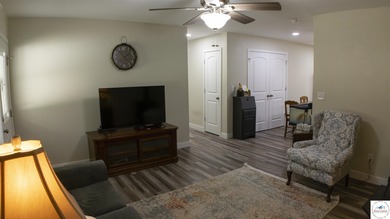 ABSOLUTELY STUNNING lake home right off of Hwy UU and just 3.4