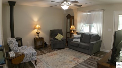 ABSOLUTELY STUNNING lake home right off of Hwy UU and just 3.4