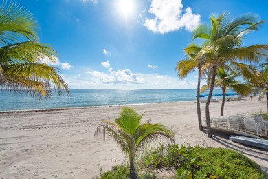 Just steps from the sand, this large 736 sqft 1-bedroom condo at