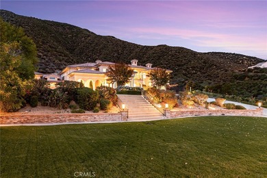 Welcome to an exceptional custom-built estate in the prestigious