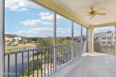 TOP FLOOR END UNIT OVERLOOKING THE LAKE & FOUNTAIN. Spacious
