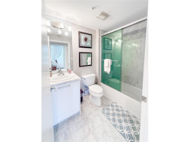 Live the high life in this stunning condo in the desirable