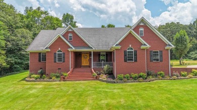 Nestled minutes from Pickwick Lake, this stunning gem has