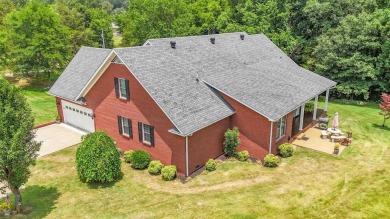 Nestled minutes from Pickwick Lake, this stunning gem has