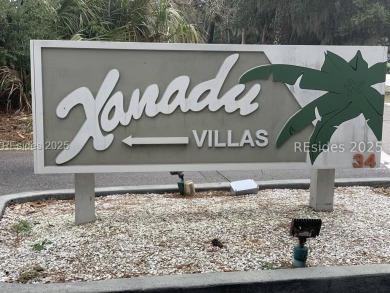 Nicely remodeled first floor villa with pool view, granite