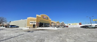 Modern strip mall with 6 tenants plus 1 vacancy. Prime location