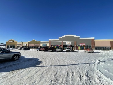 Modern strip mall with 6 tenants plus 1 vacancy. Prime location