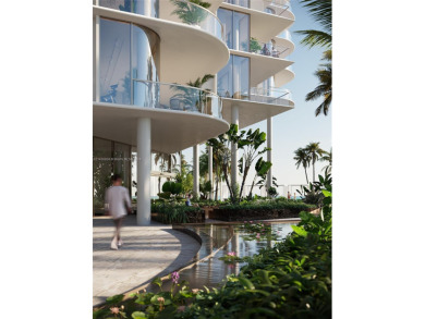 Rising from the most peaceful and expansive stretch of sand on