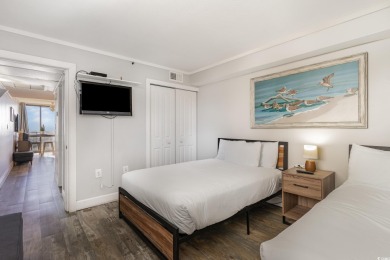 Welcome to Unit 201 at the Meridian Plaza, an oceanfront