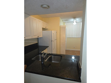 Experience the best of lakefront living in this bright and airy