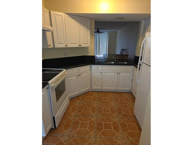 Experience the best of lakefront living in this bright and airy