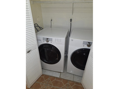 Experience the best of lakefront living in this bright and airy