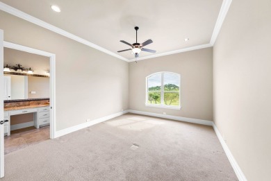 Elegantly situated on the 18th hole of Comanche Trace's