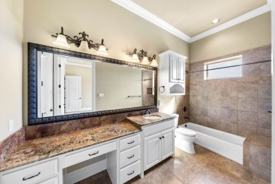 Elegantly situated on the 18th hole of Comanche Trace's