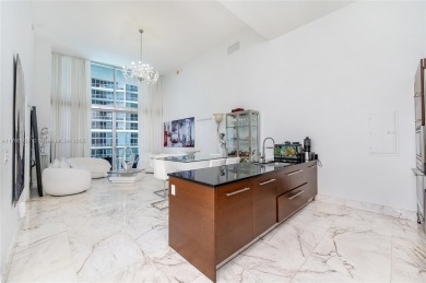 An exquisite 2-bed 2-bath + den residence with breathtaking 16ft