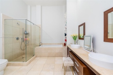 An exquisite 2-bed 2-bath + den residence with breathtaking 16ft