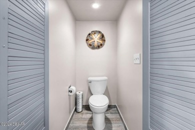 Experience luxury oceanfront living in this fully renovated