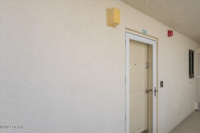 Experience luxury oceanfront living in this fully renovated