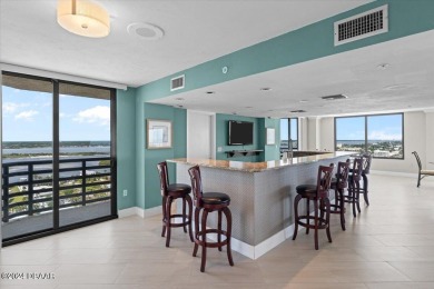 Experience luxury oceanfront living in this fully renovated