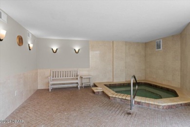 Experience luxury oceanfront living in this fully renovated