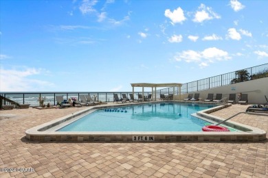 Experience luxury oceanfront living in this fully renovated
