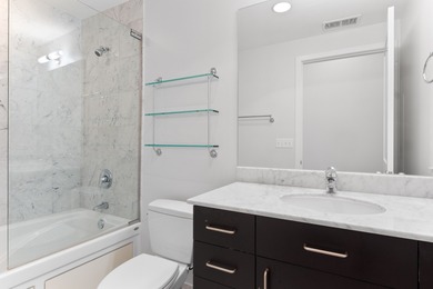 Welcome to refined city living in this boutique luxury building