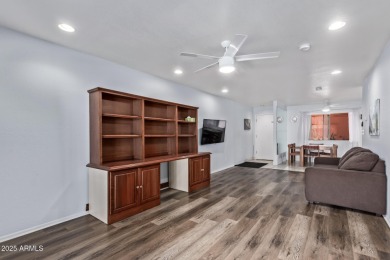 This highly desired ground level home provides great views and