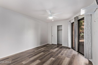 This highly desired ground level home provides great views and