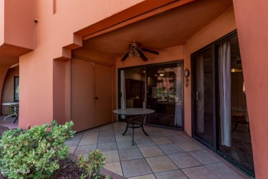 This highly desired ground level home provides great views and