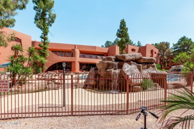 This highly desired ground level home provides great views and