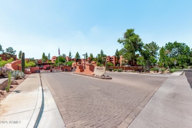 This highly desired ground level home provides great views and