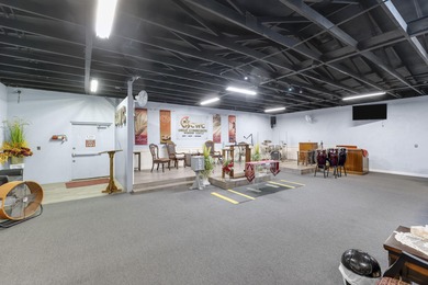 The 5400 SF office/warehouse building sits on just over an acre