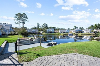 Lakefront meets Lowcountry at 312 Hampton Lake Drive. Here