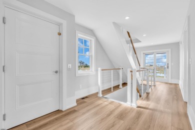 Welcome to your Beach House, a stunning example of contemporary