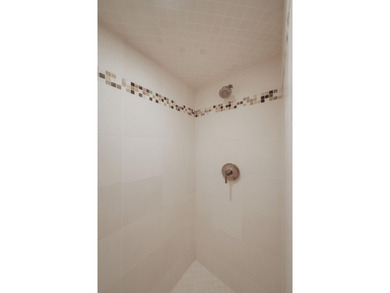 Discover a sophisticated and spacious retreat at the exclusive